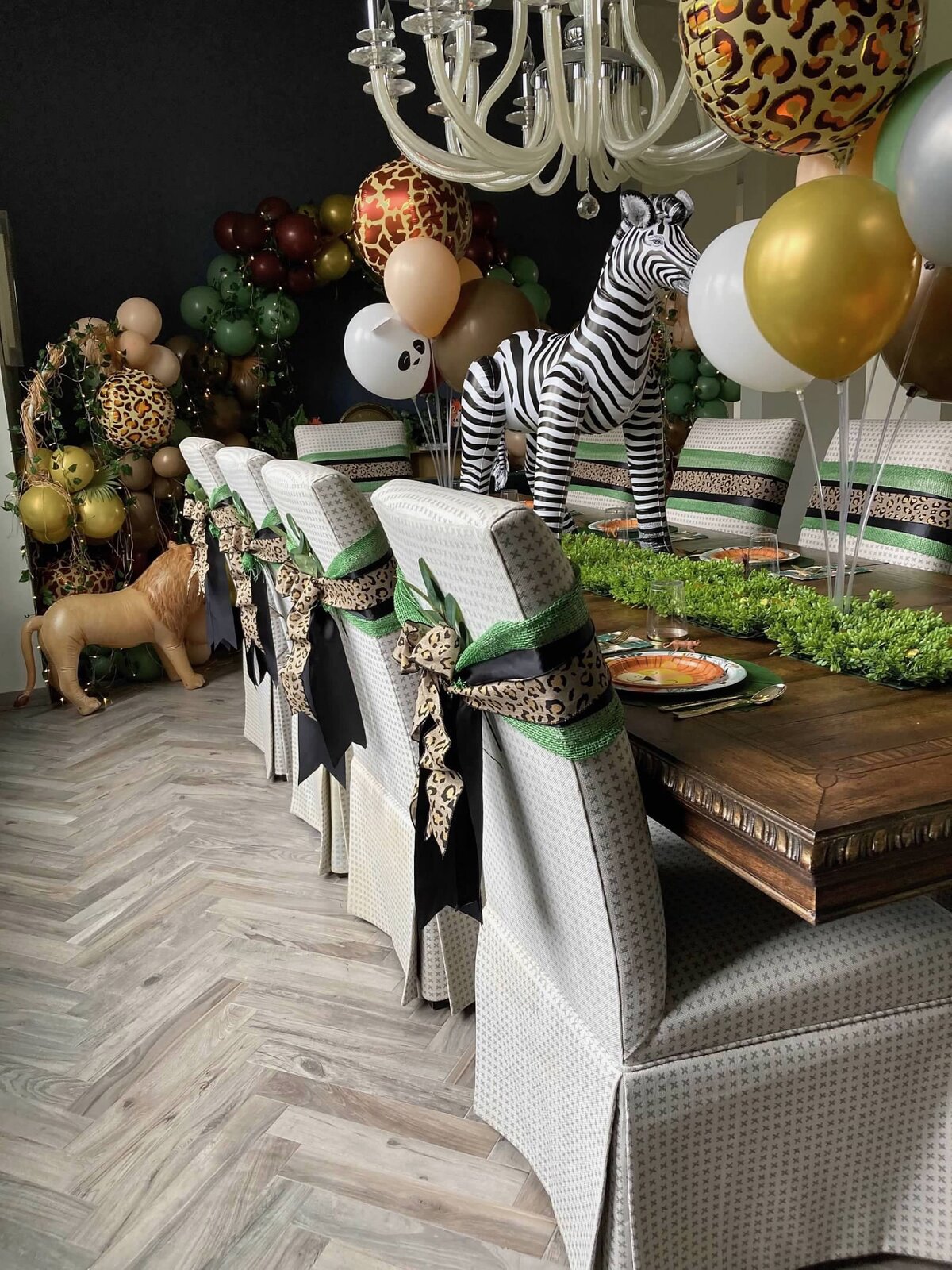 Safari dining chairs with zebra centerpiece