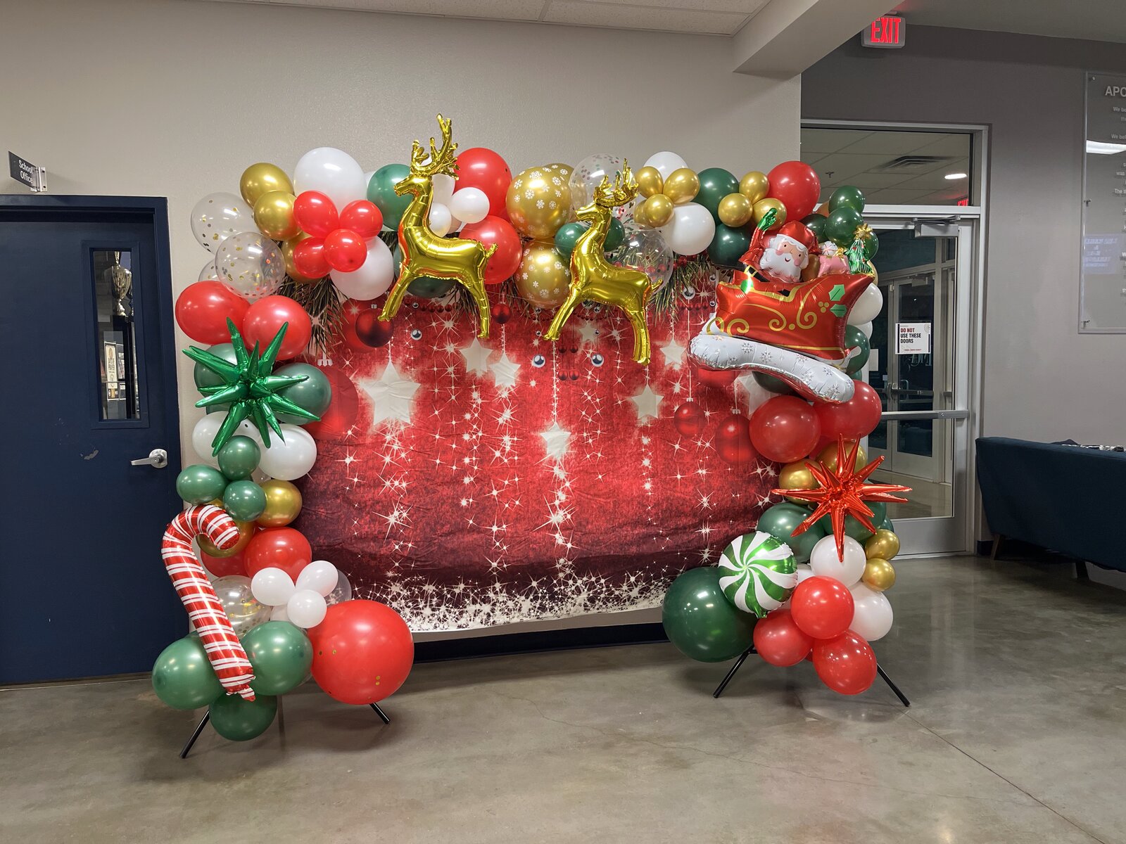 Christmas balloon backdrop with reindeer and santa